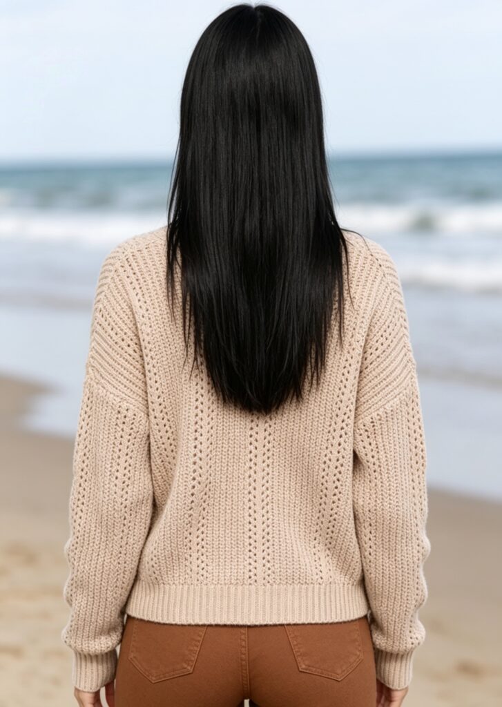 Women's fashionable knitted cardigan back view